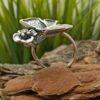Дамски-сребърен-пръстен-украсен-от-голяма-пеперуда-и-нежно-цвете
