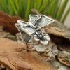 Дамски-сребърен-пръстен-украсен-от-голяма-пеперуда-и-нежно-цвете